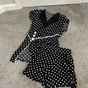 Two piece retro black polka dot set top and shorts in a women’s size XS